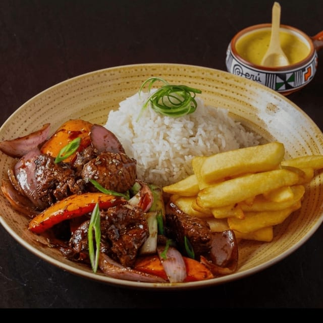 Pollo-Chicken Saltado.