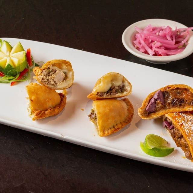 TWO Beef and Cheese Empanadas.